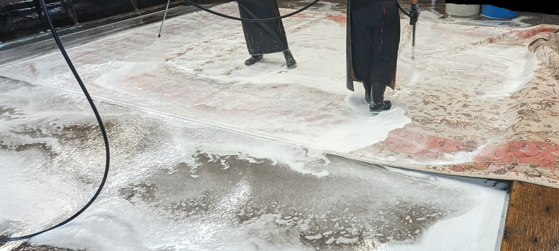 New Way Carpet Cleaning hand-washing a royal Persian carpet