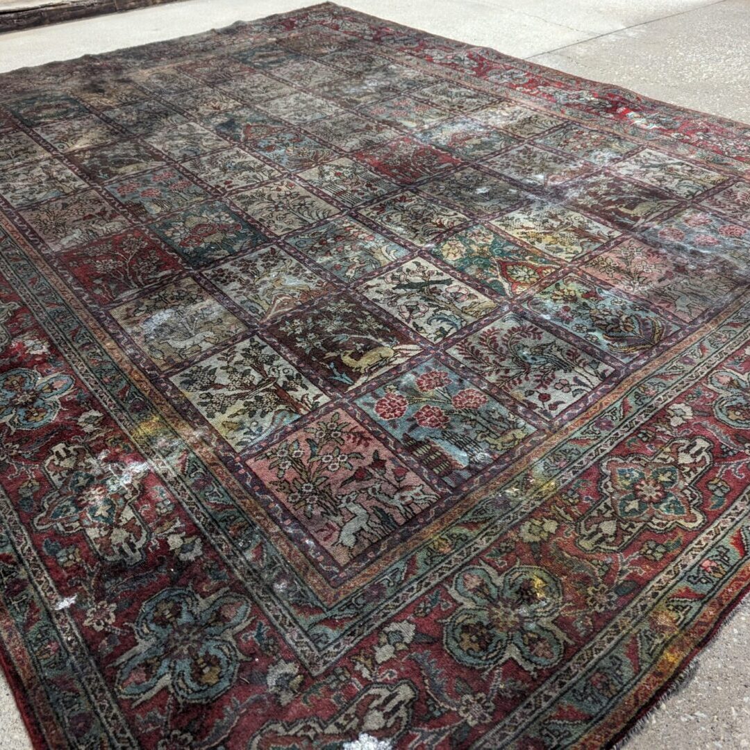 Water & fire damaged area rug prepared for cleaning